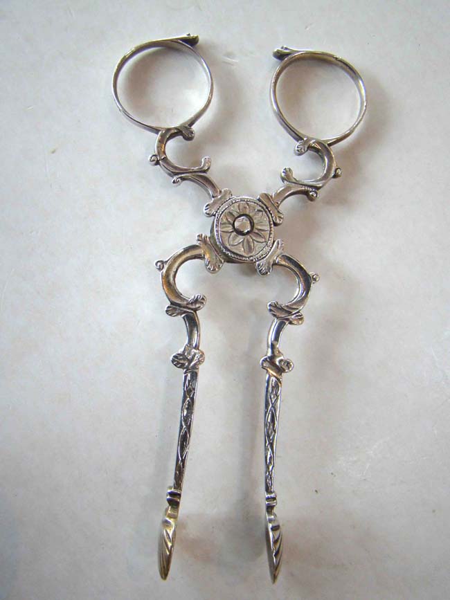 A RARE 18th century IRISH sterling silver sugar nips